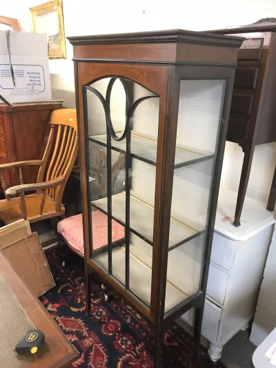 An Edwardian display cabinet with inlaid design. Dimensions 66cm wide 35cm long 160cm tall