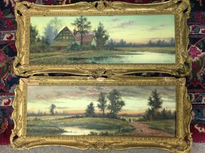 A pair of oil paintings rural views signed H Cole. Frame sizes 60cm wide 24cm tall