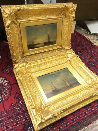 A pair of Oil paintings on board, sailing boats in decorative gilded frames. Painting size 22x16cm Frame size 46x38cm