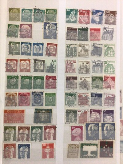 Four albums containing a good collection of world stamps from early 20th century onwards including some British Empire and Colonial stamps.  (4) three green one red albums
.