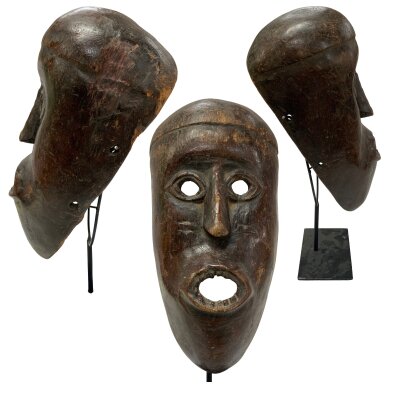 An Antique Tribal mask, poss Ivory Coast, West Africa. With museum style stand. 32cm x 16cm.