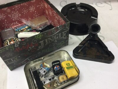 A box of lighters, Bakelite ashtrays
