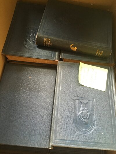 A box containing a collection of 20 volumes of The Punch Library Circa 1930's- NO RESERVE