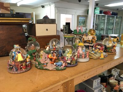 A collection of Disney snowglobes including winnie the pooh, cinderella, jungle book, nightmare before christmas etc. No reserve