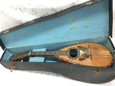 An Italian Francesco Salomone Napoli mandolin. Approximately 60cm long
