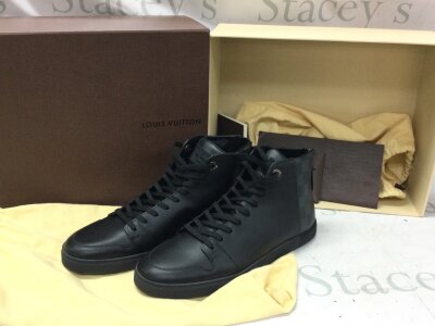 A boxed pair of Mens Louis Vuitton line-up sneaker boots , size 9. With receipt , spare laces. As new condition