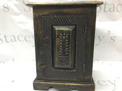A small carved wooden table cabinet, no reserve. 30cm tall 20cm wide 15cm long