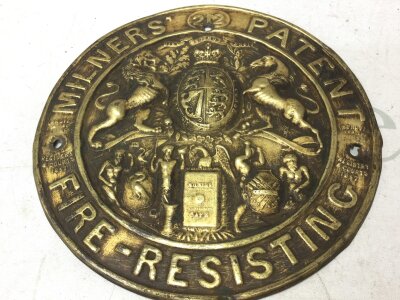 A Victorian brass embossed safe badge for miners Pat fire resisting safe. 21cm wide