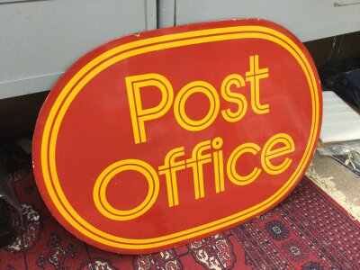 An enamelled metal sign for post office. 84cm wide