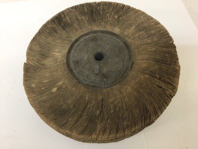 A rare Muntoscope Reel depicting Comical Charlie Chaplin Keystone Cop possibly 1914 coming out of the Police Office to a waiting crowed.The reel with subject number 7053 serial number 72.