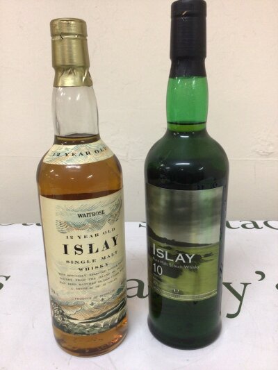 A bottle of Islay Single Malt and a Islay 10year Malt both 70cl. (2)