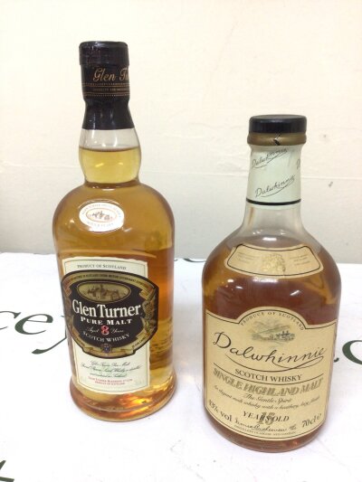 A Bottle of Dalwhinnie 15year old Scotch Whisky single malt slight lower level on bottle and a Glen Turner 8 year old Whisky both 70cl bottles  (2)