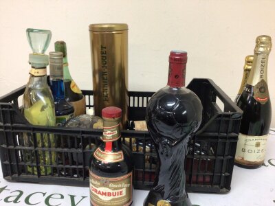 A collection of Champagne and spirits including a World Cup French 1997 bottle of wine Drambuie triple crown port and others