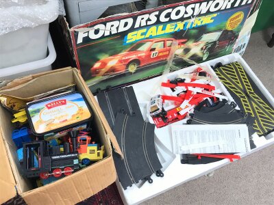 A Scalextric set Ford RS Cosworth and some toy trains . No reserve