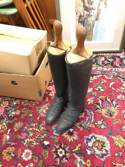 A pair of leather riding boots