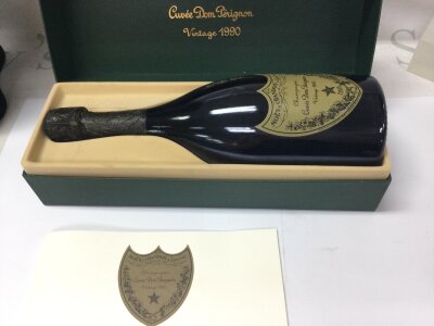 A boxed bottle of 1990 Dom Perignon champagne