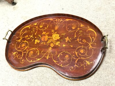 An Edwardian tea tray. 56cm wide
