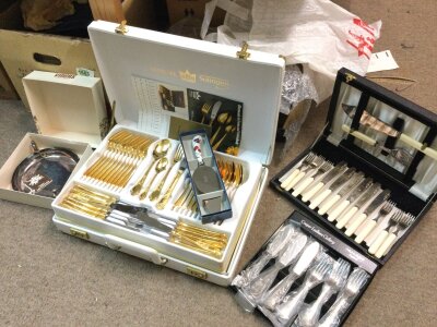 A German canteen of silver gilt cutlery and other boxed cutlery