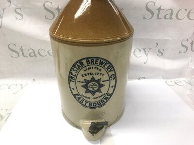 A vintage stoneware brewery flagon by Fulham pottery for the star brewery company.
Crack at the bottom as pictured..
Approximately 45cm tall.