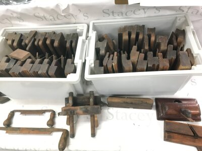 A large collection of vintage moulding planes and other tools