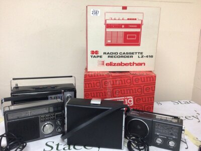 A Collection of Vintage Radios as new some boxed cameras and a UA12 vintage record deck with speaker and other conforming accessories.