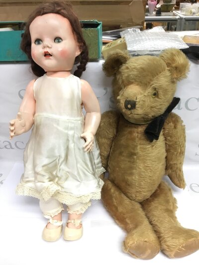 A circa 1945-47 Australian joy bear and various dolls.