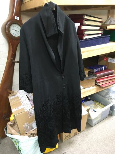 An Edwardian black coat, furs and lace.