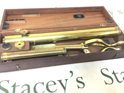 A nice example of a 19th century oxidised and lacquered telescope with a table top folding stand interchangeably lens engraved Haynes Lynn  in a mahogany fitted box  length 53cm