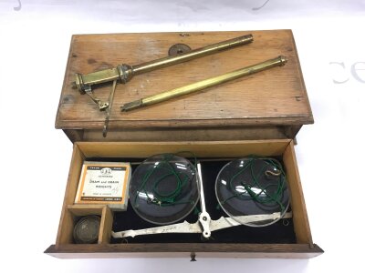 A cased pair of balance scales.