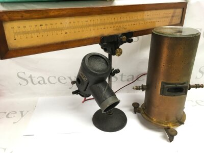 An electrostatic voltmeter by Robert W Paul of London and a W G Pye & Co scientific instrument with an E Leitz Wetzlar attachment (2).