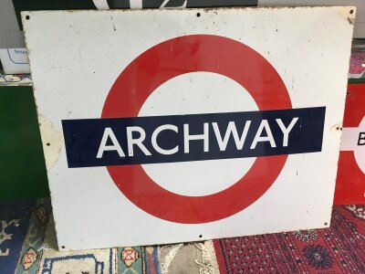 An enamel underground station sign for Archway, approx 71cm x 56cm.