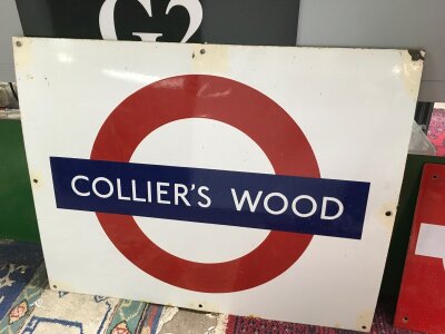 An enamel underground station sign for Collier's Wood, approx 71cm x 56cm.