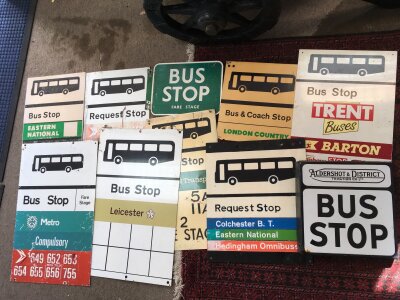 A collection of bus stop signs.