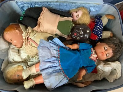 A case of vintage dolls together with 2 additional cases and contents.