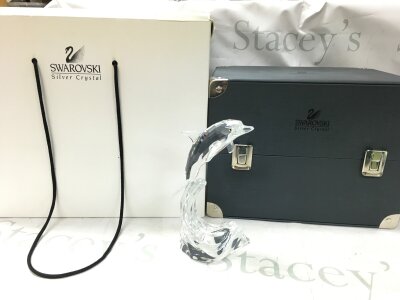 A boxed Swarovski crystal glass Maxi dolphin figure, 20cm tall. No obvious damage or restoration