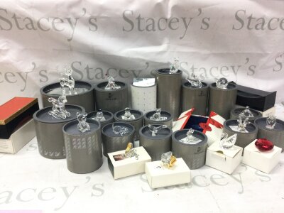 A collection of boxed Swarovski figures , no reserve