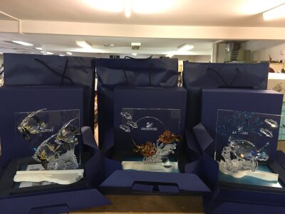 Swarovski Wonders Of The Sea boxed Trio- including Community, Harmony and Eternity. Together with three boxed Wonders of The Sea Title plaque paperweights, a figure of a fish and a Christmas Tree ornament.  No obvious damage or restoration