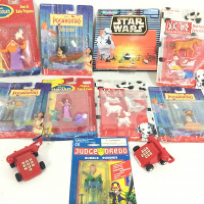 A Collection of Carded Figures including Disney And Star Wars Micro Machines.