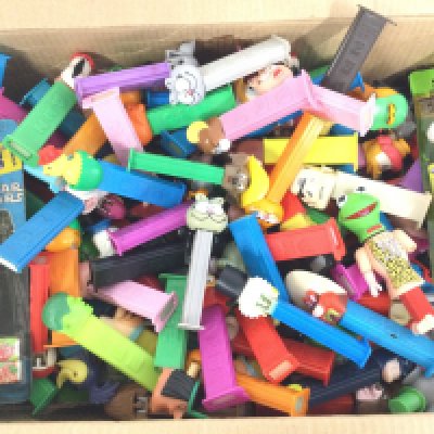 A Box Containing a Collection of Pez Dispensers.