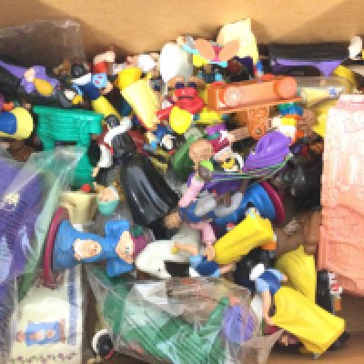 A Collection of Plastic Snow White Figures.