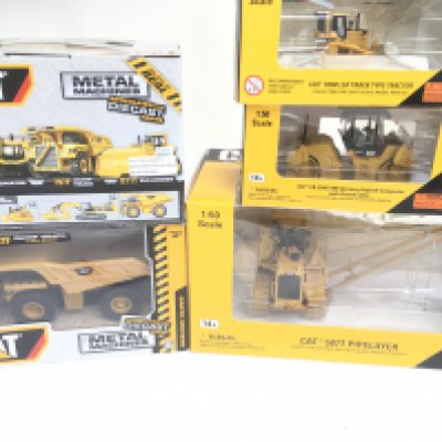 A Box Containing Boxed Diecast Construction Vehicles.