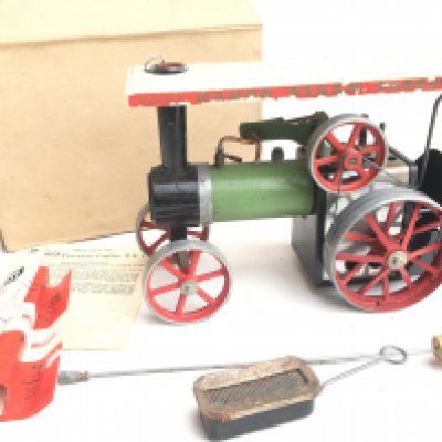 A Boxed Mamod Steam Tractor.