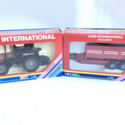 A Boxed Ertl Case International Tractor and Barge Wagon #223. 1:32 Scale.