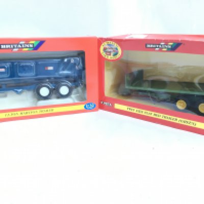 A Boxed Britains 12-Ton Marston Trailer #00049 and a Twin Axle Flat Bed Trailer #42015.