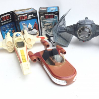 A Collection off Vintage Star Wars Ships and 2 X Boxed Mini Rigs. Including a land Speeder, Tie Fighter. A. ISP-6 and a Energizer.
