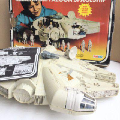 A Boxed Star Wars The Empire Strikes Back Millennium Falcon. Box is Worn. Damage to top gun and Ball missing.