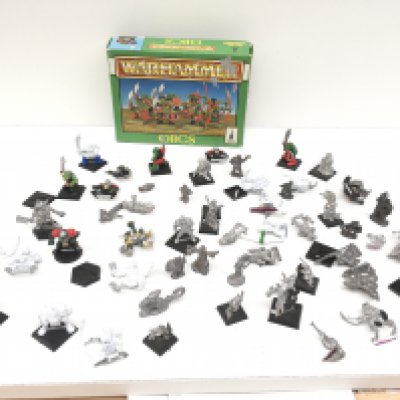 A collection in excess of 50 pieces both plastic and metal Warhammer models. Some painted