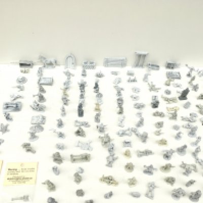 A box containing in excess of 150 metal figures from a Warhammer collection all unpainted.