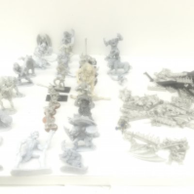 Boxes containing in excess of unpainted 50 metal figures and accessories from a Warhammer collection. Made by Grenadier and others