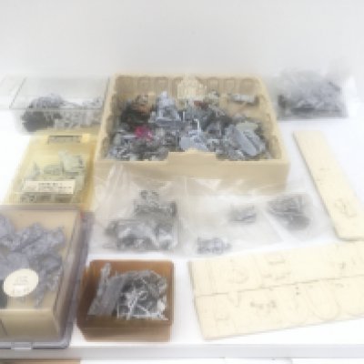 A varied group of metal figures and accessories together with some resin pieces all from a Warhammer collection.